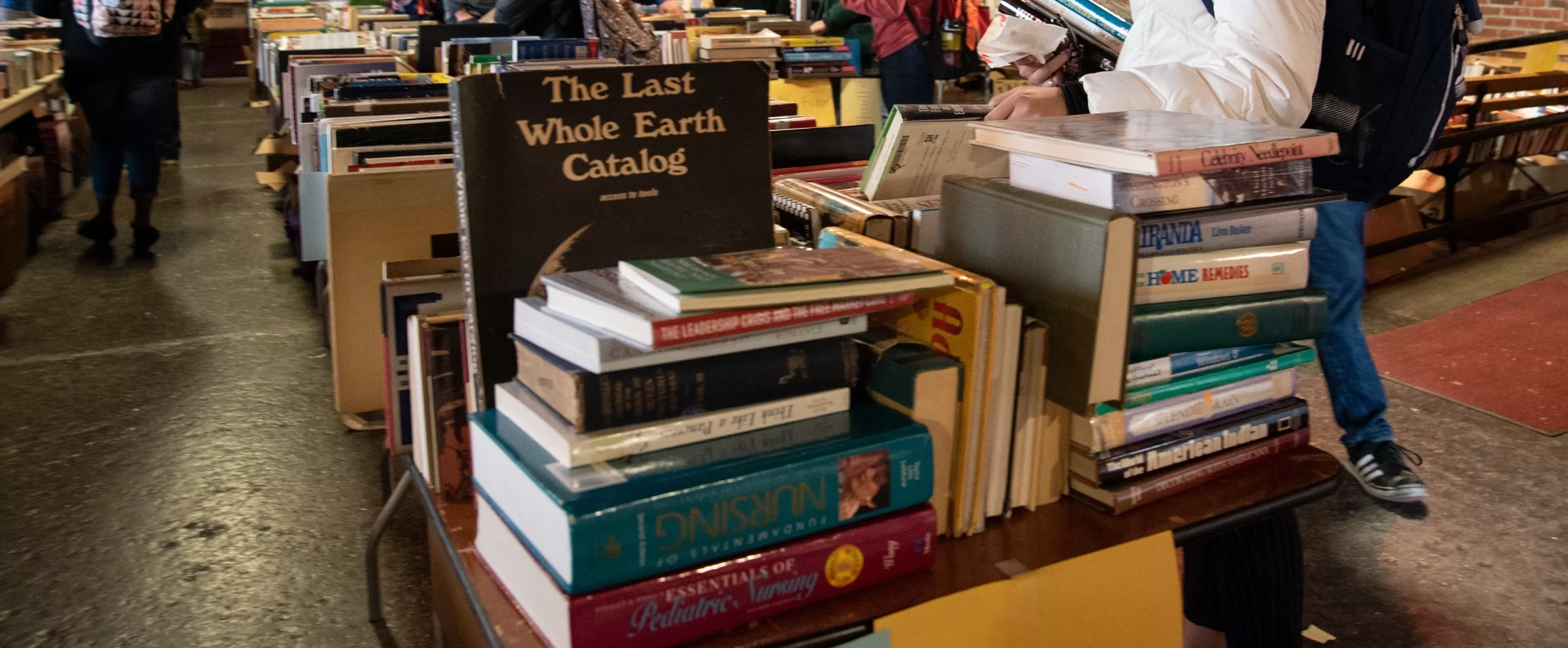 Students browse books at the Honors Book Sale