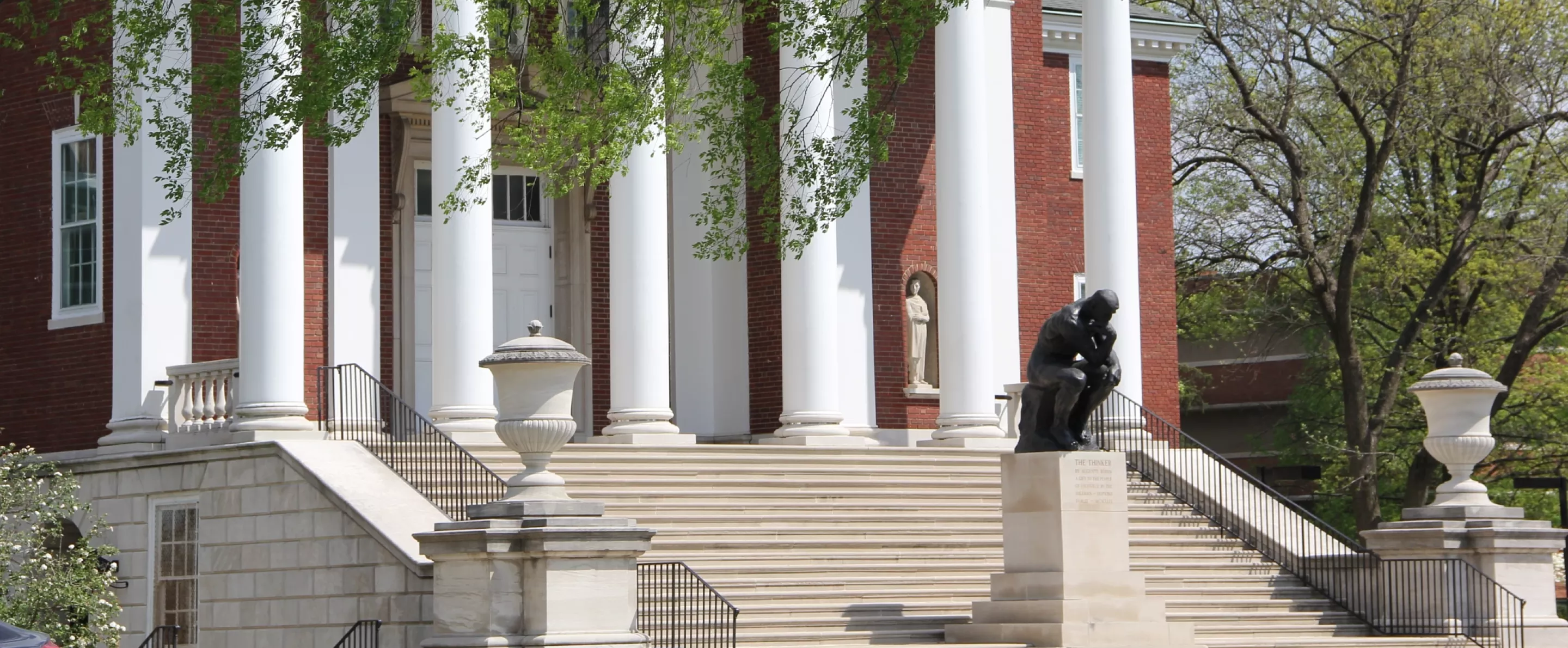 Steps to Grawemeyer Hall with the Thinker