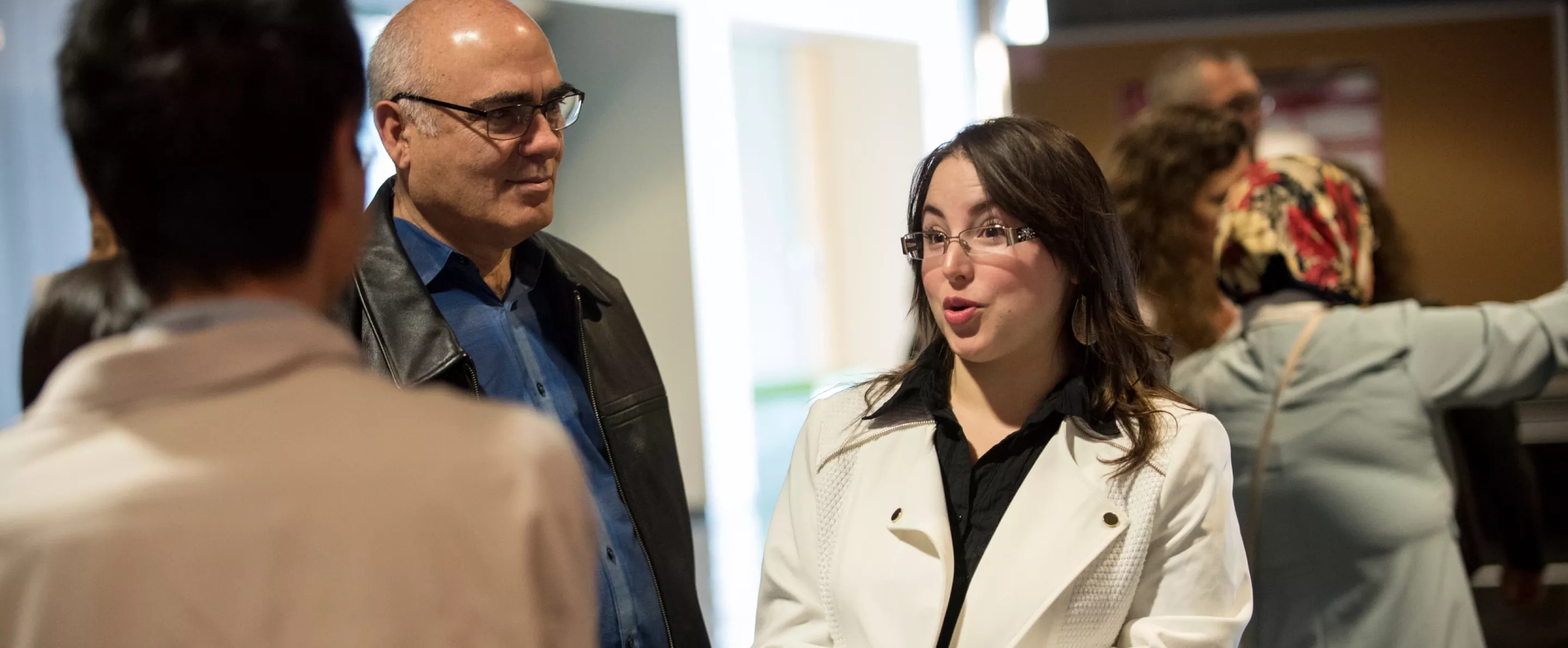 Graduate research students in a discussion