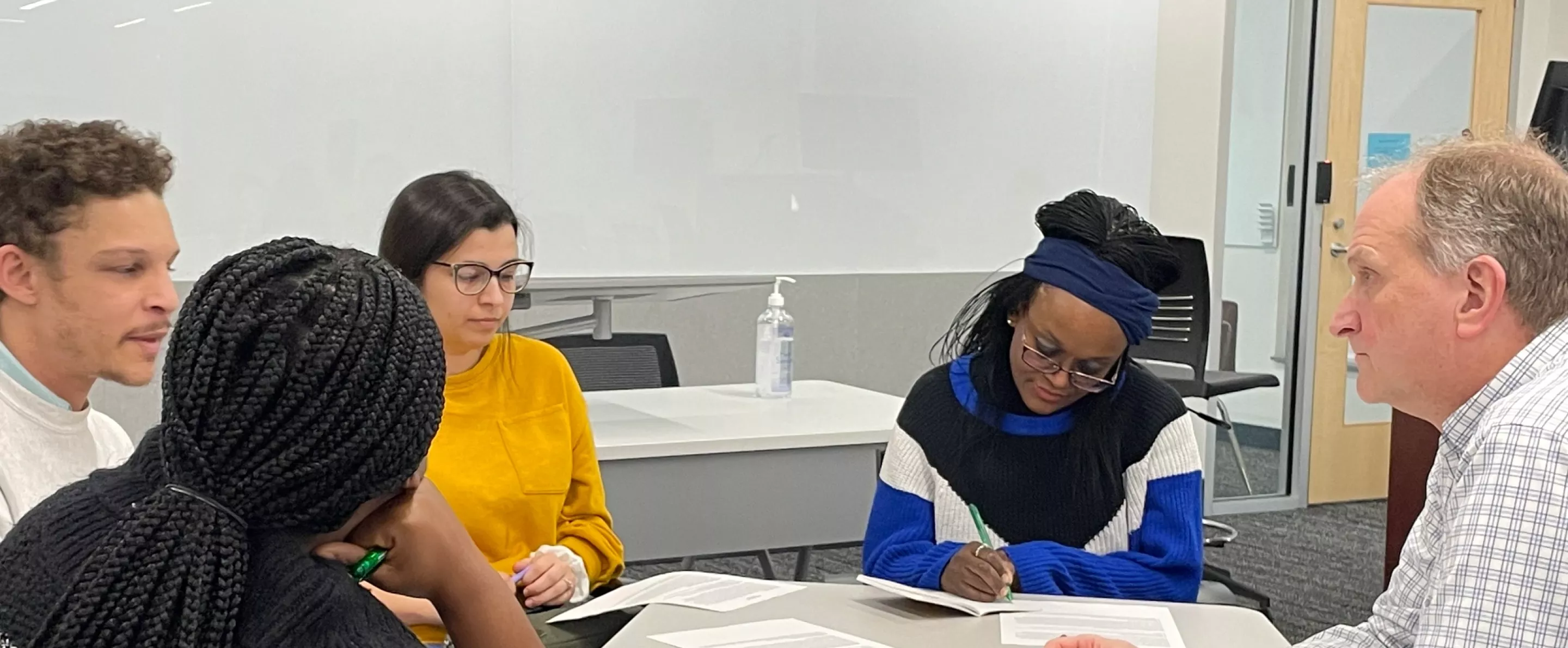 Group in discussion around a table