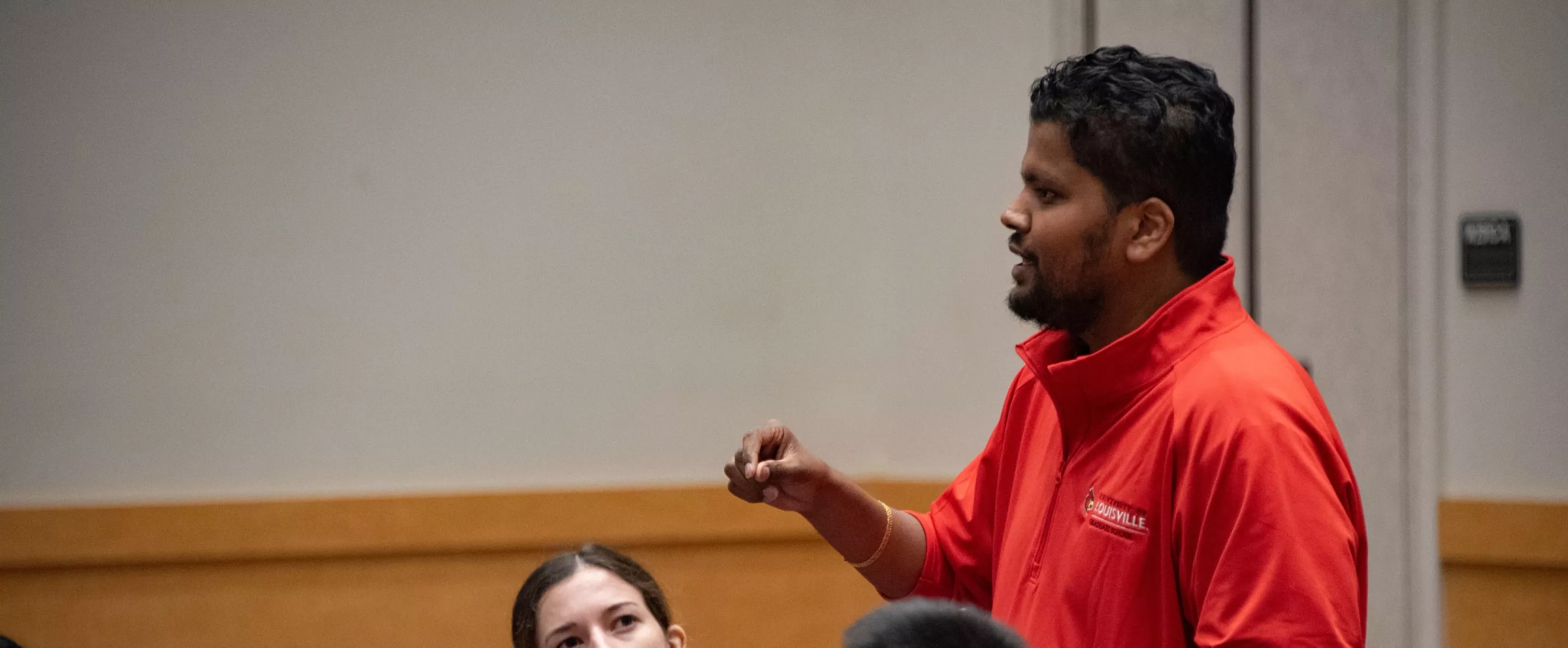 Graduate school staff leading a workshop.