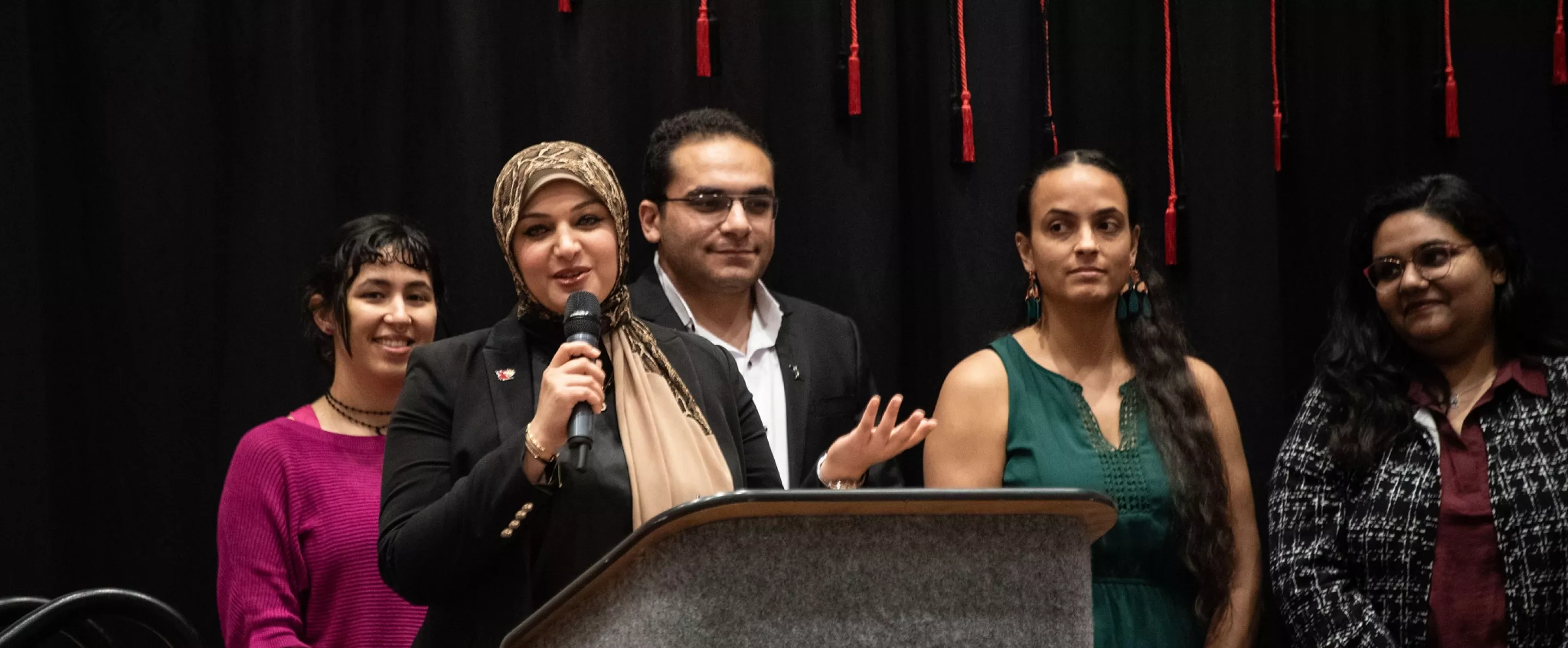 Graduate students speaking.