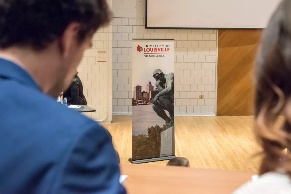 Grad Students in auditorium