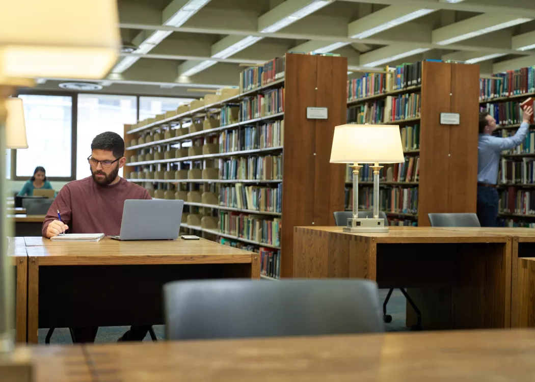 Student studying in the library.