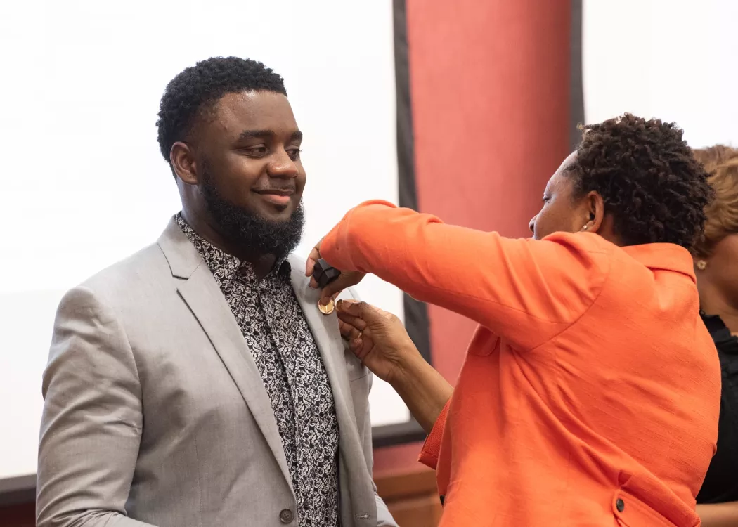 Graduate student pinning ceremony.