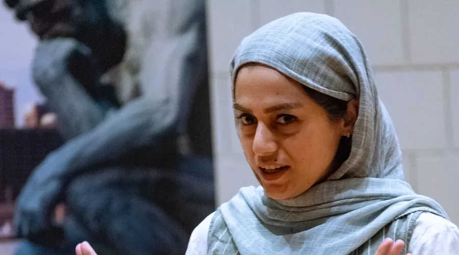 Marziehsadat Rezaei, People's Choice Winner, presenting during the 2025 3MT Competition.