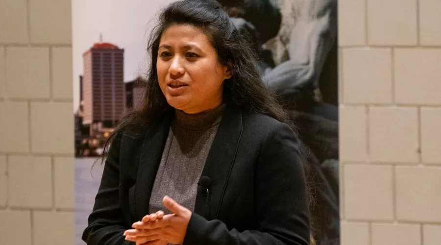 Smriti Maskey, 3MT 2025 winner, presenting at competition.